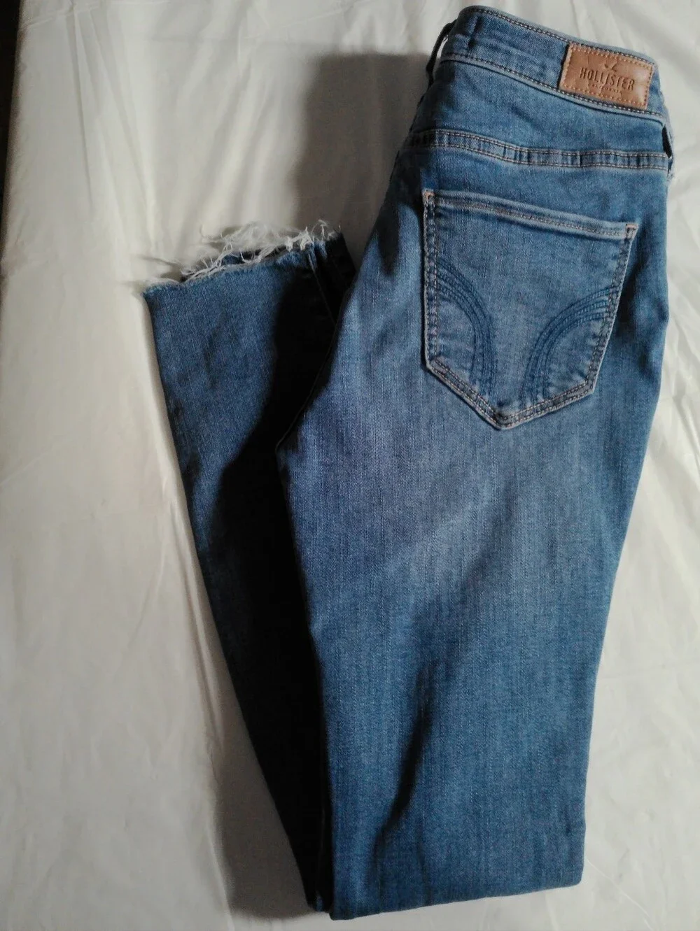 Hollister Women's Light Blue Frayed Hem Jeans